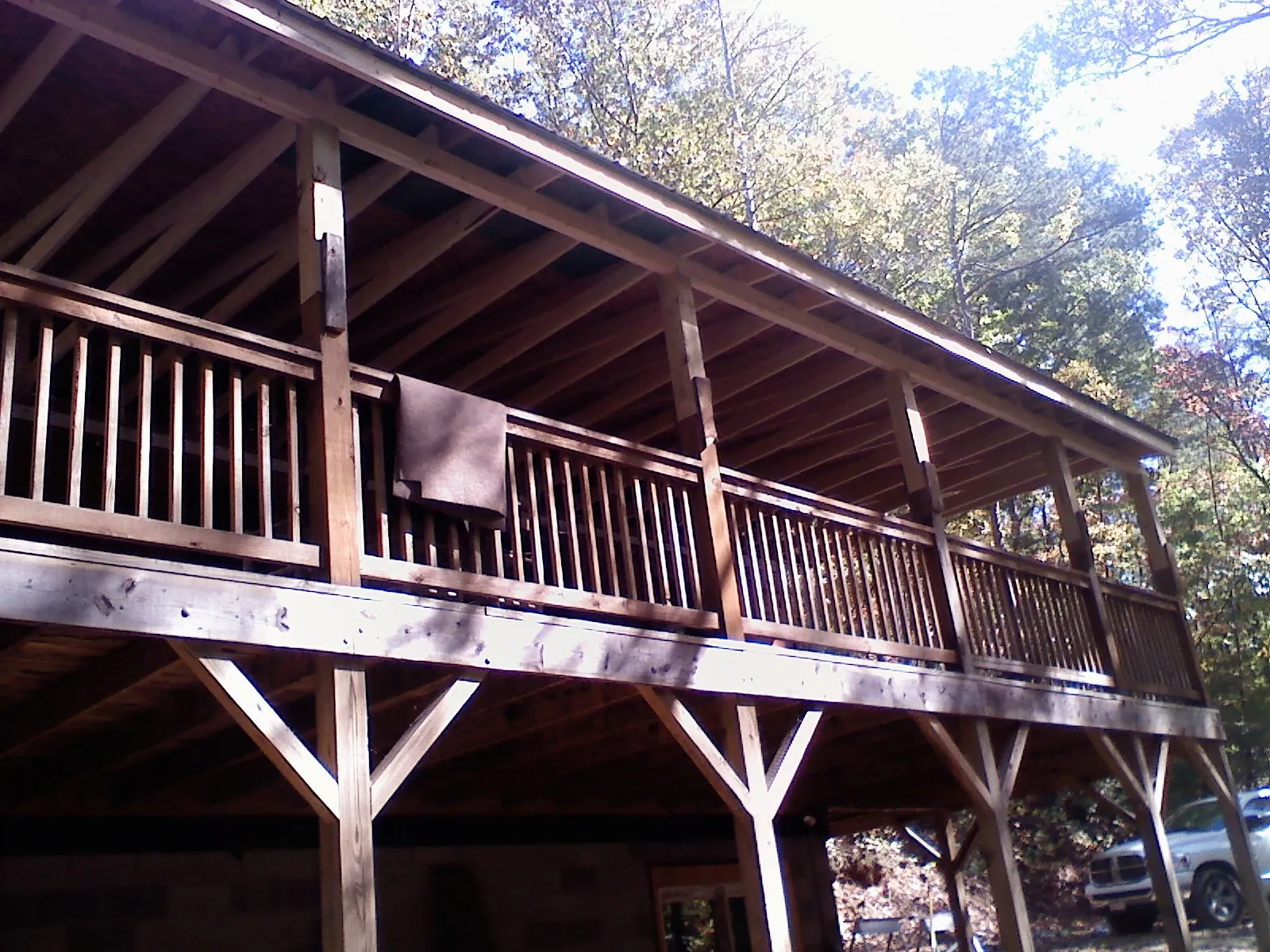 Timber framing under a new elevated porch and deck — Roof Leak Repair in Independence by Roofing Brothers